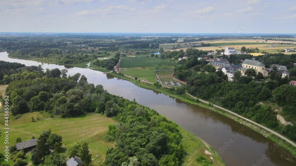Top view of the city of Drohiczyn on the Bug River.Over the river rises the castle mounain.from the bird's eye view over the city you can see the monastery buildings-Jesuits,Frannciscans,Benedictine Top view of the city of Drohiczyn on the Bug River.Over the river rises the castle mounain.from the bird's eye view over the city you can see the monastery buildings-Jesuits,Frannciscans,Benedictine
