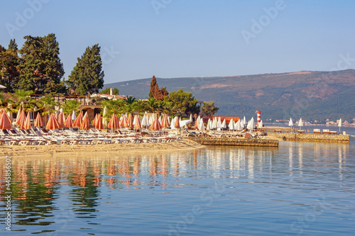 Summer beach vacation. Beautiful Mediterranean landscape on sunny summer morning. Montenegro,  Adriatic Sea, Bay of Kotor, Tivat city