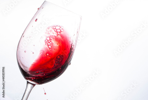 red wine splash. Red wine. Glass. Background. Food. 