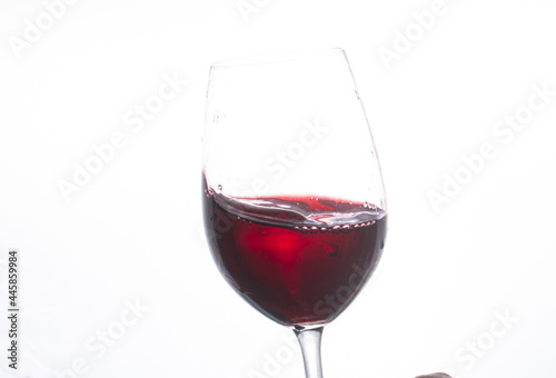 red wine pouring into glass