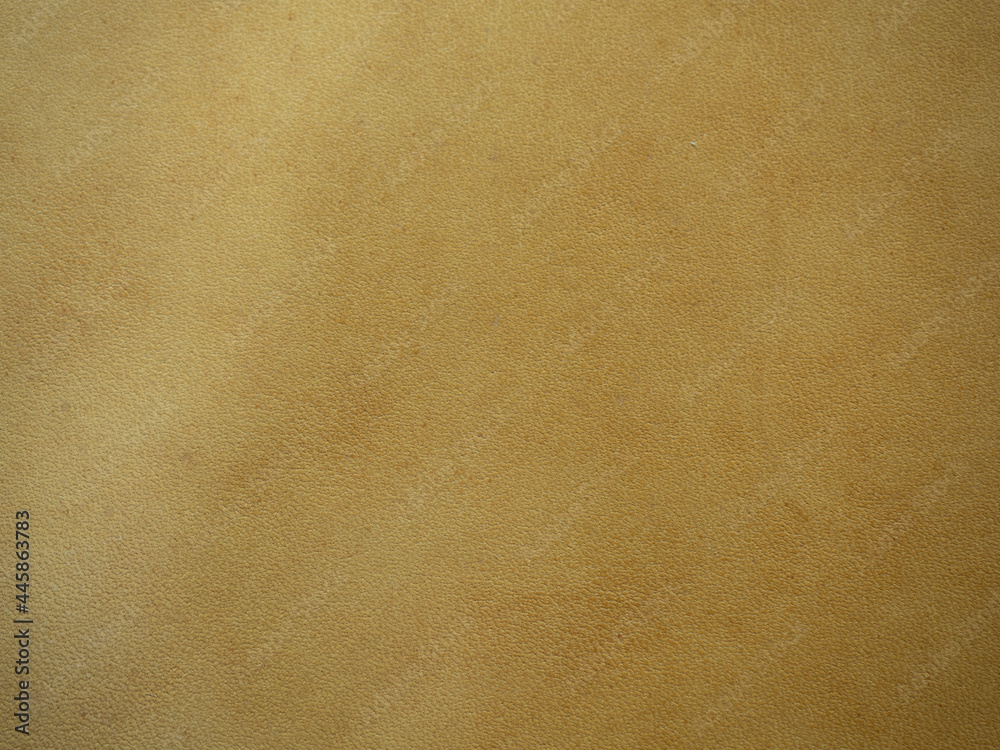 A close-up shot of the surface of leather used for handmade A close-up shot of the surface of leather used for handmade