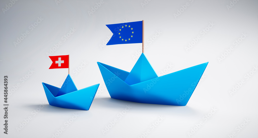 Paper boats with EU and Switzerland Flags Paper boats with EU and Switzerland Flags