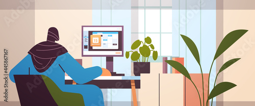 arab businesswoman planning day scheduling appointment in calendar on monitor screen time management concept
