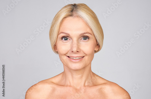 Portrait of a charming pretty mature woman over 50 years old.