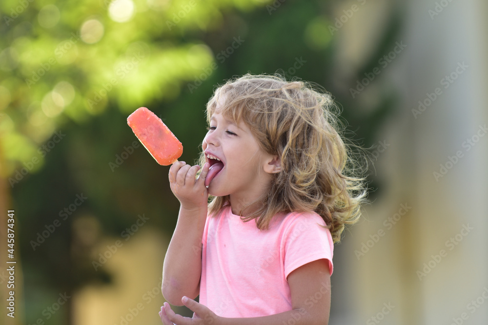 Portrait of a small blond boy eating ice cream. Cute kids face. Positive emotional child. Portrait of a small blond boy eating ice cream. Cute kids face. Positive emotional child.