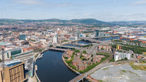 Aerial view on river and buildings in City center of Belfast Northern Ireland. Drone photo, high angle view of town © Maciej