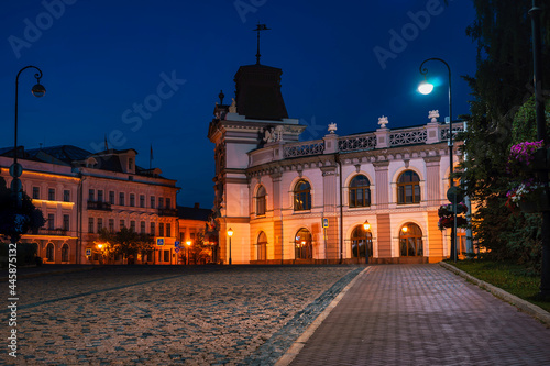 National Museum of the Republic of Tatarstan in Kazan at Kremlin Street. Night city view. A street with cobblestone paving.