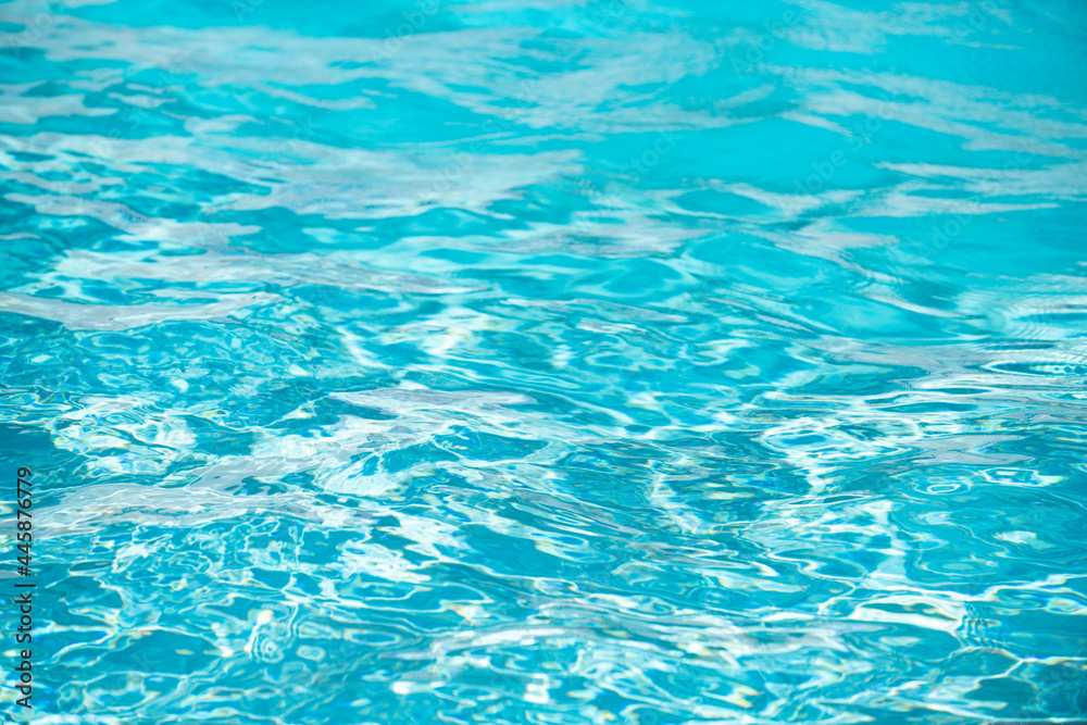 Water in swimming pool, background with high resolution. Wave abstract or rippled water texture.