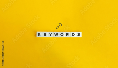 Keywords banner and concept. Block letters on bright orange background. Minimal aesthetics. photo