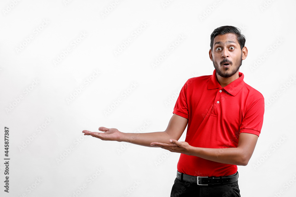 Happy Asian man in t-shirt and showing expression isolated over white background. Happy Asian man in t-shirt and showing expression isolated over white background.
