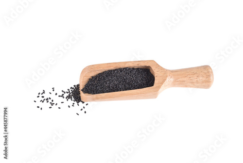 Basil seeds or Hairy, Sabja in wooden scoop isolated on white background.