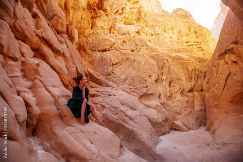 Beautiful woman resting in the desert