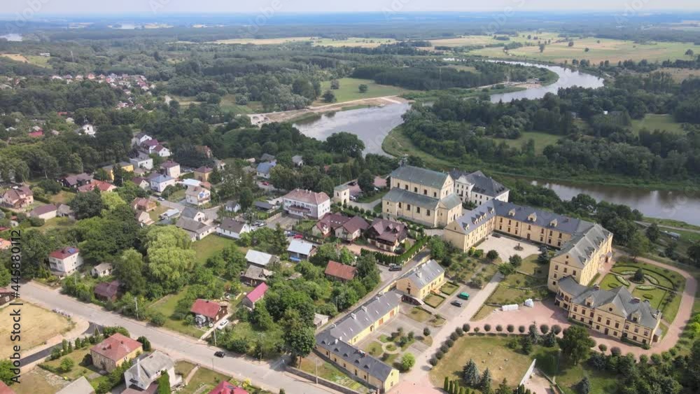 Top view of the city of Drohiczyn on the Bug River.Over the river rises the castle mounain.from the bird's eye view over the city you can see the monastery buildings-Jesuits,Frannciscans,Benedictine Top view of the city of Drohiczyn on the Bug River.Over the river rises the castle mounain.from the bird's eye view over the city you can see the monastery buildings-Jesuits,Frannciscans,Benedictine