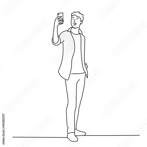 Guy taking selfie for social media on mobile phones
