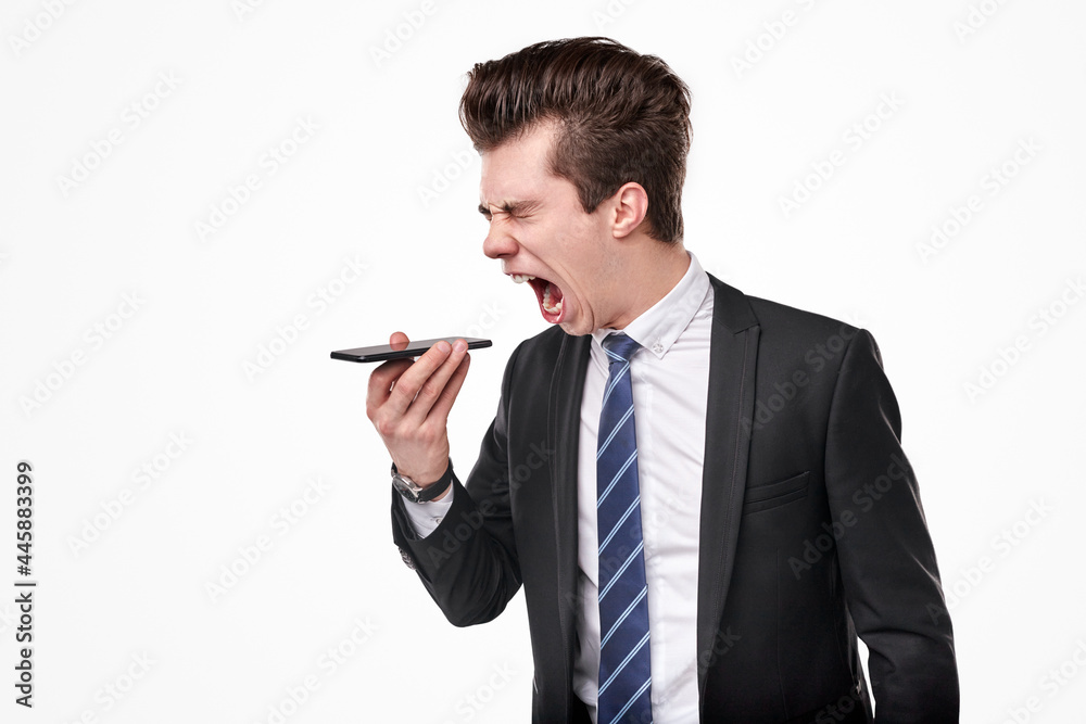 Angry boss screaming during phone conversation Angry boss screaming during phone conversation
