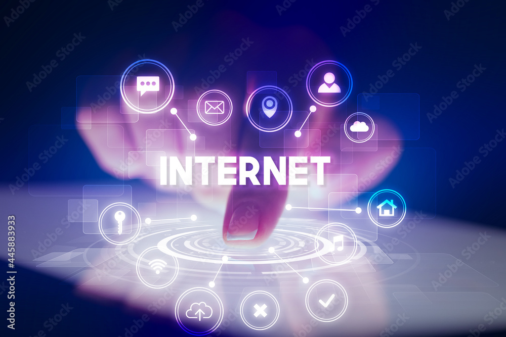 Finger touching tablet with web technology icons concept Finger touching tablet with web technology icons concept