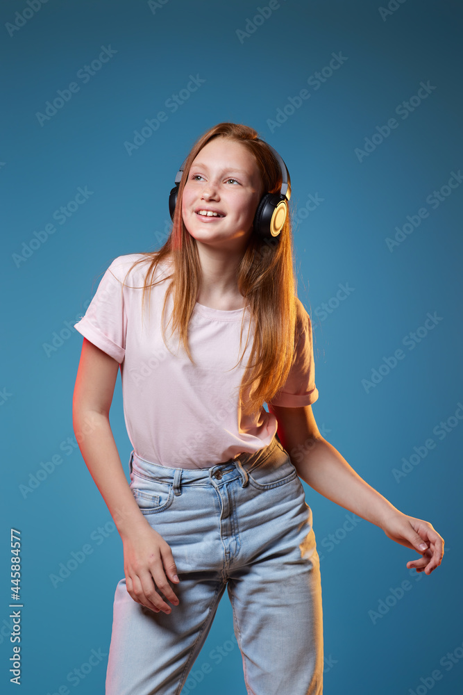 three kids girls standing together on blue background three kids girls standing together on blue background