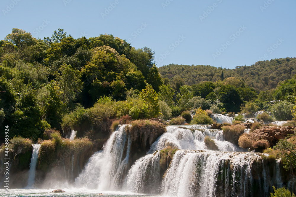 Landscape in Krka National Park in Croatia, known for its beautiful waterfalls Landscape in Krka National Park in Croatia, known for its beautiful waterfalls