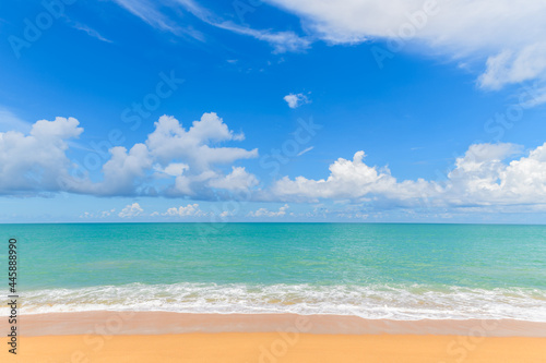 Beautiful beach and sea with Blue Sky Background at Mai Khao Beach Phuket 