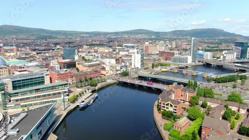 Aerial view on river and buildings in City center of Belfast Northern Ireland. Drone photo, high angle view of town