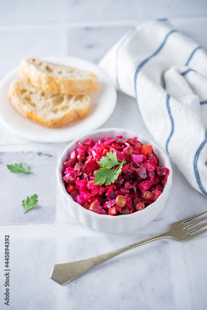 Beet potatoes green peas carrots pickled cucumbers salad Beet potatoes green peas carrots pickled cucumbers salad
