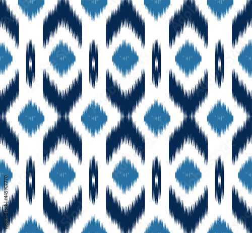 Abstract . Ikat seamless pattern traditional. line indigo on white background. design for pillow, print, fashion, clothing, fabric, gift wrap.  Vector.