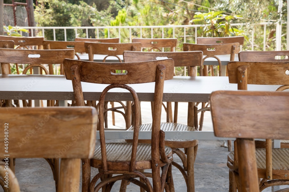 empty tables and chairs in the outdoor area of a rural restaurant in Lebanon
