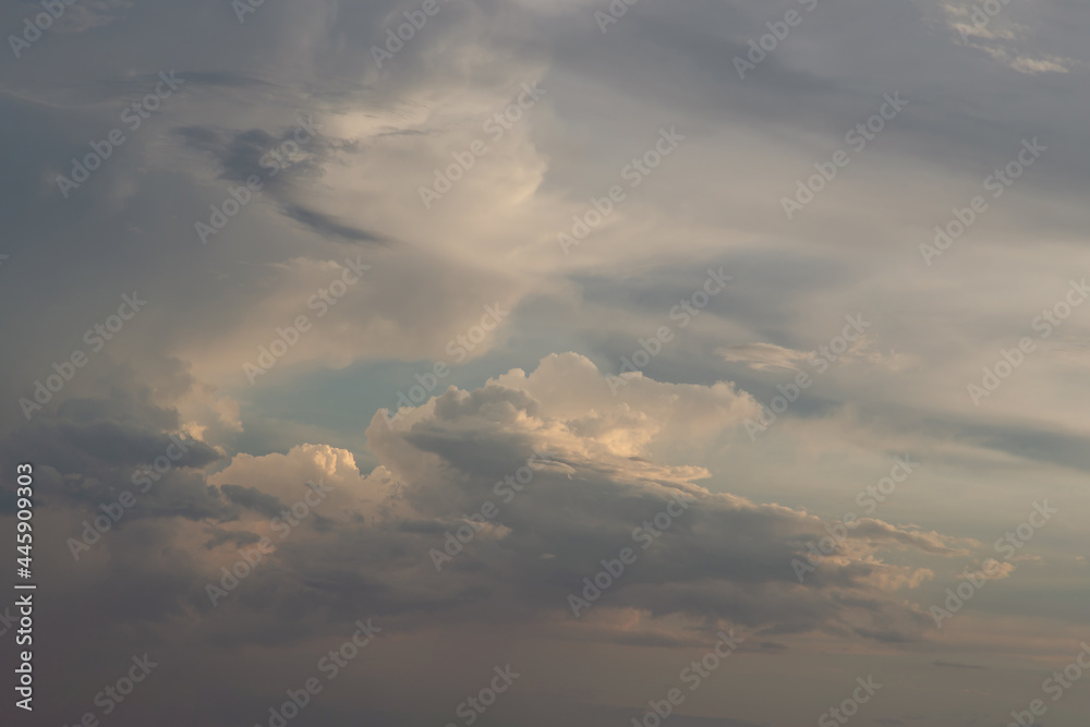 The sun shines through the clouds in the sky. The shape of the clouds evokes imagination and creativity. They can be used as wallpapers that look amazing. Copy space, No focus, specifically. The sun shines through the clouds in the sky. The shape of the clouds evokes imagination and creativity. They can be used as wallpapers that look amazing. Copy space, No focus, specifically.