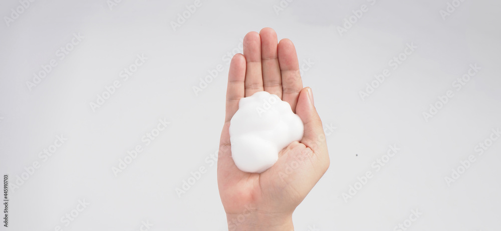 Hand washing gesture with foaming hand soap and bubble on white background. Hand washing gesture with foaming hand soap and bubble on white background.