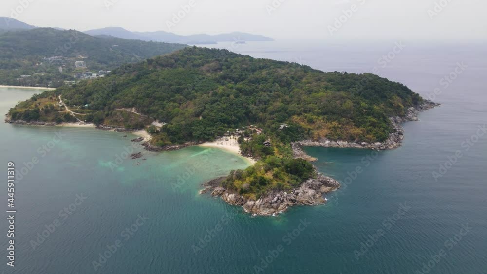 4K Aerial Side View of Paradise Beach in Phuket. Beach, sea and sand. Drone view of a beautiful white tropical sand beach on a summer day in Thailand. Top view empty and clean beach. Phuket, Thailand 4K Aerial Side View of Paradise Beach in Phuket. Beach, sea and sand. Drone view of a beautiful white tropical sand beach on a summer day in Thailand. Top view empty and clean beach. Phuket, Thailand