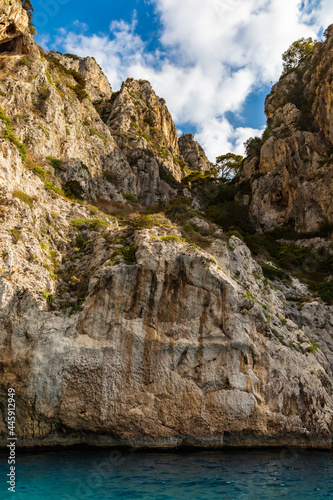 Edge of high cliff next to the sea at sunny day on Capri island