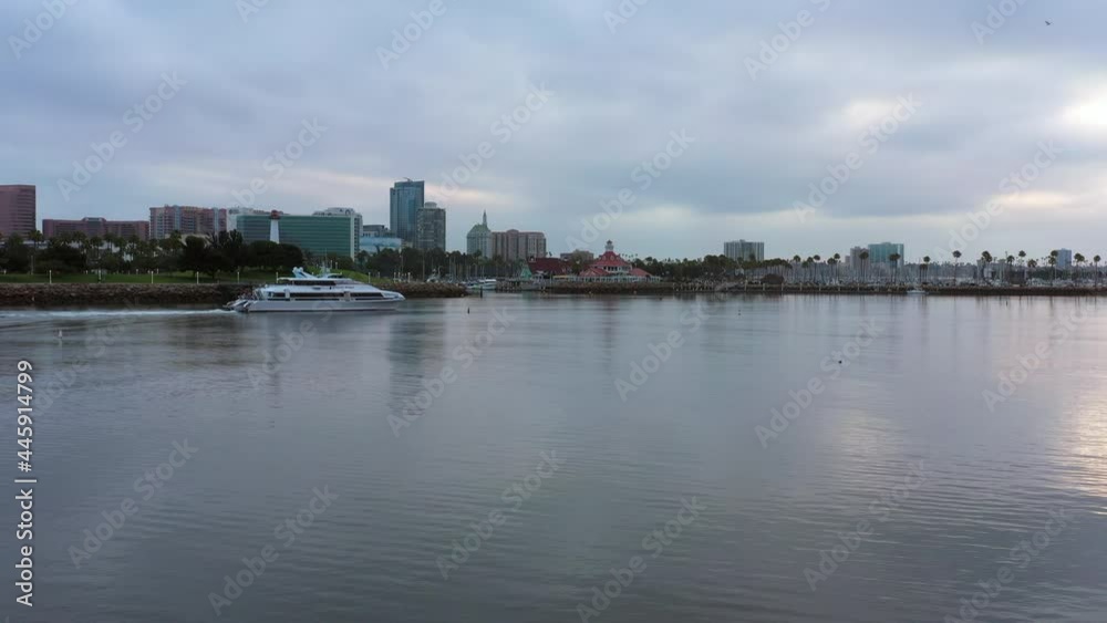 Boat moving across bay in Long Beach California Boat moving across bay in Long Beach California