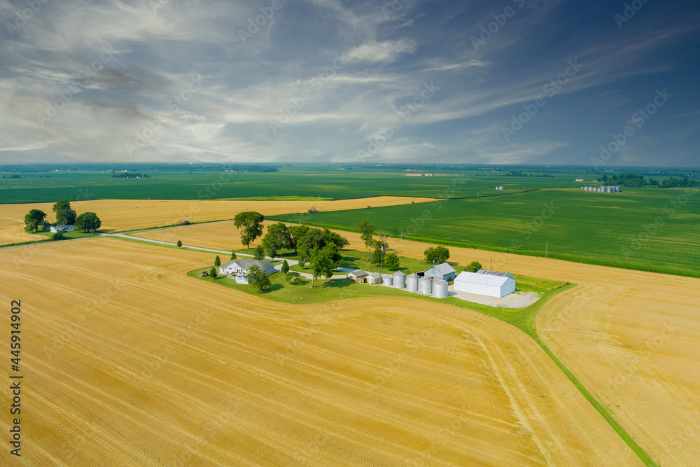 Panoramic view of silver silos storage elevator on agro processing drying cleaning of agricultural products