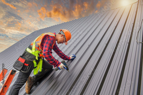 Roofer Construction worker install new roof,Roofing tools