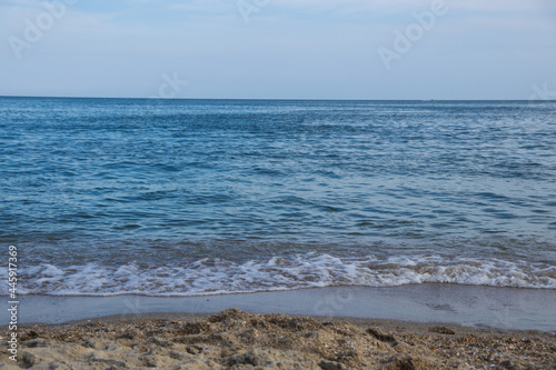 The front view in the morning sky is bright blue with clear white clouds. Feeling calm  cool  relaxing. The idea for cold background and copy space on the top. Black Sea.