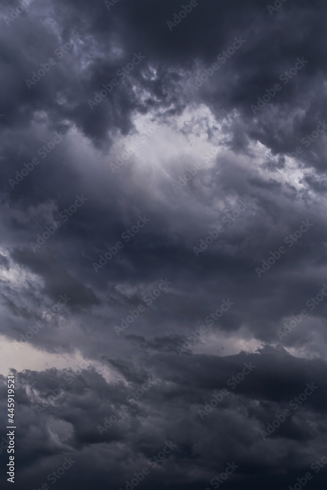 Storm sky with dark grey black epic clouds background texture, hurricane with thunderstorm, cyclone