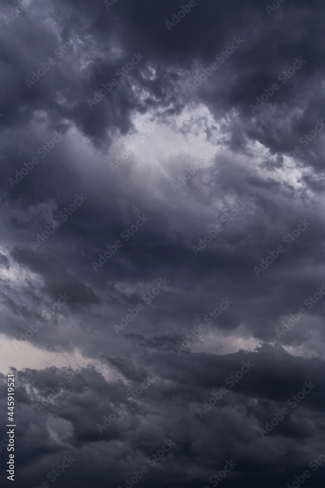 Storm sky with dark grey black epic clouds background texture, hurricane with thunderstorm, cyclone Storm sky with dark grey black epic clouds background texture, hurricane with thunderstorm, cyclone