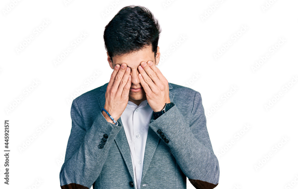 Young hispanic man wearing business clothes rubbing eyes for fatigue and headache, sleepy and tired expression. vision problem Young hispanic man wearing business clothes rubbing eyes for fatigue and headache, sleepy and tired expression. vision problem