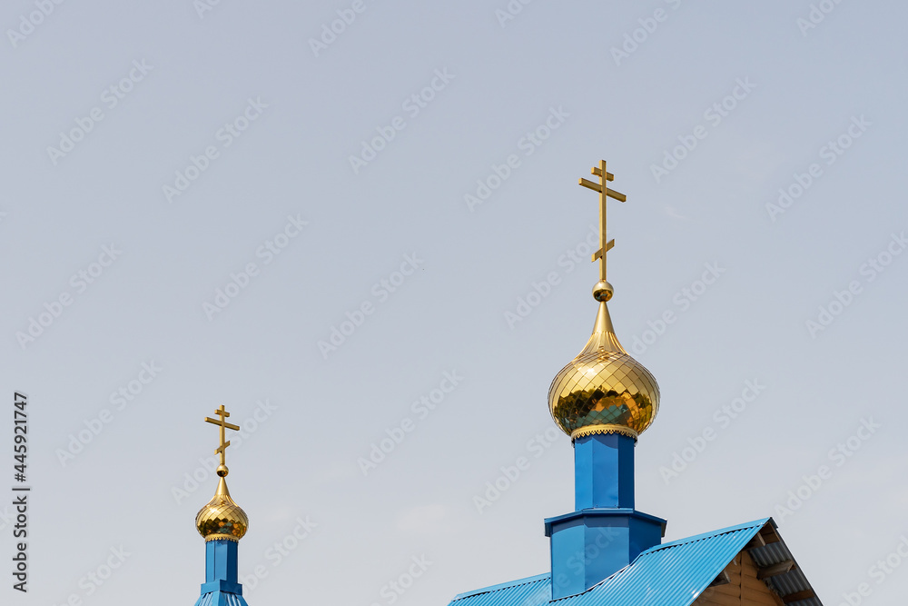 Domes with crosses, the top of the church is turned to the east. Orthodox Christian religion