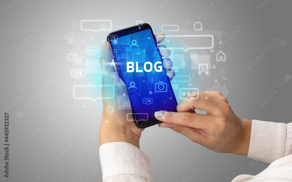 Hand using smartphone with social media concept Hand using smartphone with social media concept