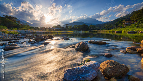 Bild auf Leinwand Sunset over beautiful river at Kiriwong village, Nakhon Si Thammarat, Thailand