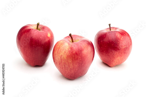 Few ripe red-yellow seasonal apples isolated on white background
