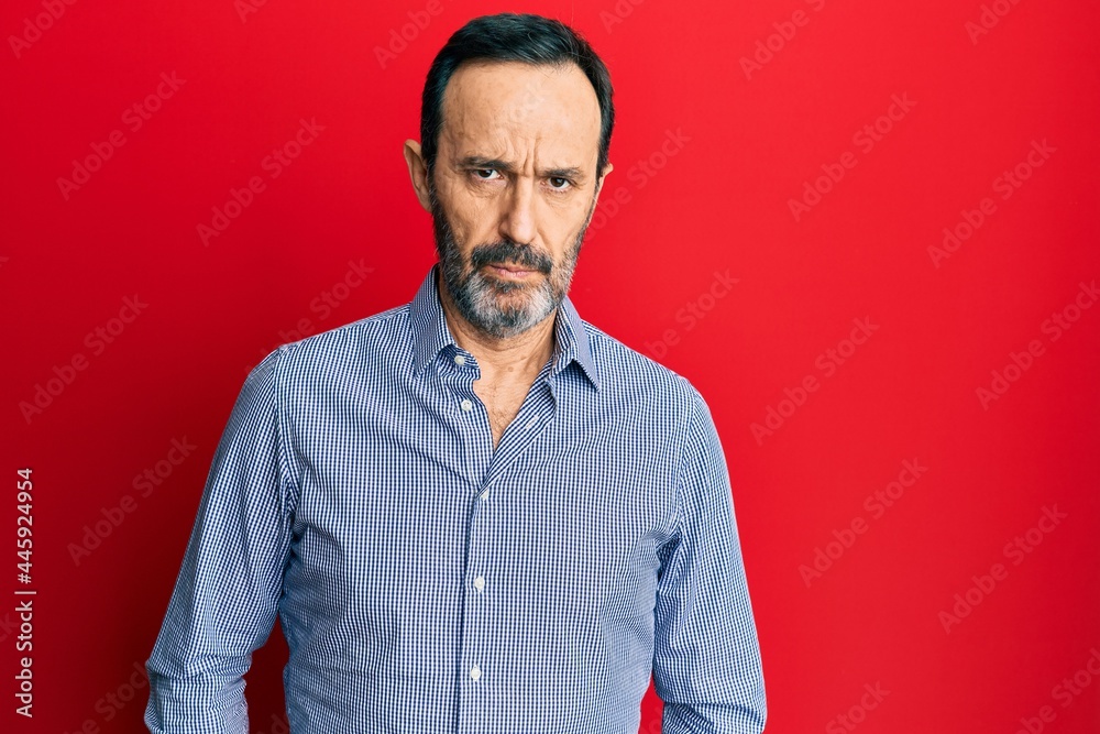 Middle age hispanic man wearing casual clothes depressed and worry for distress, crying angry and afraid. sad expression. Middle age hispanic man wearing casual clothes depressed and worry for distress, crying angry and afraid. sad expression.