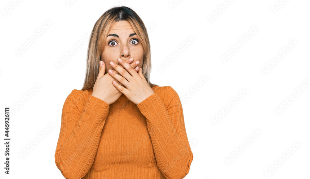 Young caucasian woman wearing casual clothes shocked covering mouth with hands for mistake. secret concept. Young caucasian woman wearing casual clothes shocked covering mouth with hands for mistake. secret concept.