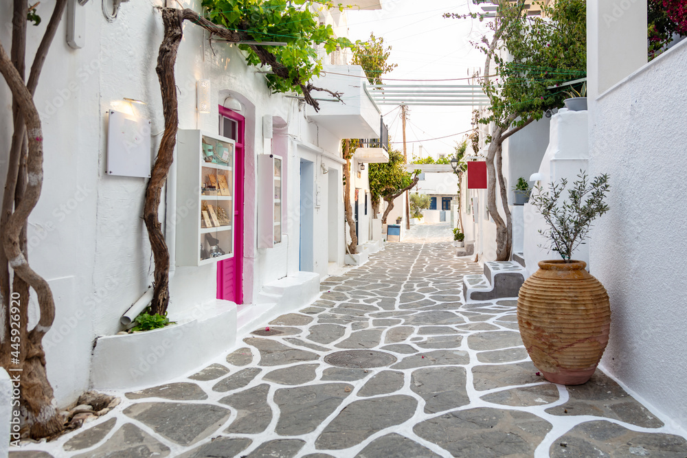 Paros island, Greece. Whitewashed buildings, narrow cobblestone streets - obrazy, fototapety, plakaty 