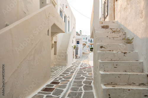 Fototapeta Naklejka Na Ścianę i Meble -  Paros island, Greece. Whitewashed buildings, narrow cobblestone streets