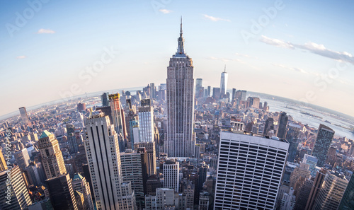 Fisheye aerial view of Manhattan in New York City, USA. Skyline panorama at sunset. Fish eye lens effect