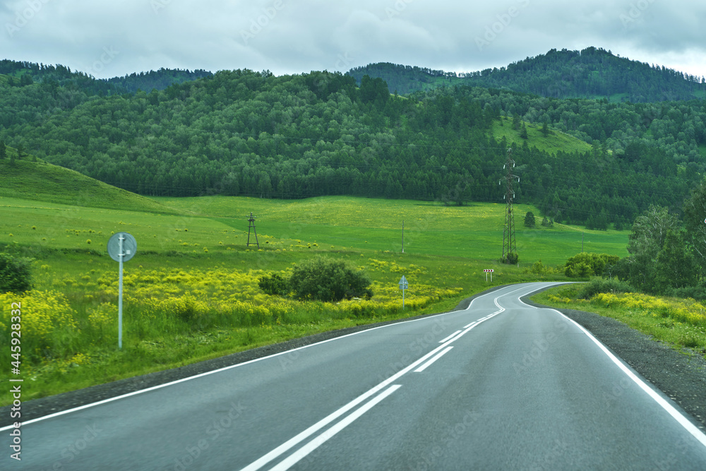 Vacation roadtrip landscape. Russian Altai mountains. Multa region. Holiday at home. Staycation concept. Long distanse road. Reduce carbon footprint. Sustainable lifestyle. Holiday trail. Local travel