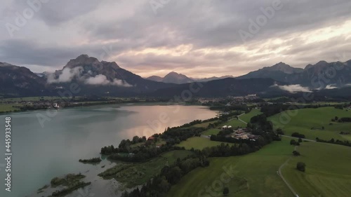 Bavarian Alps with mountains, a lake, clouds in the sunset