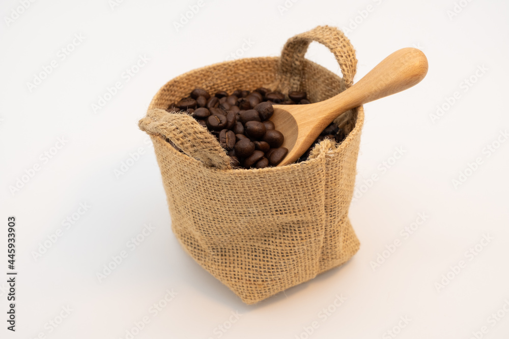 Coffee beans in hemp sack bag isolated on white background. Coffee beans in hemp sack bag isolated on white background.